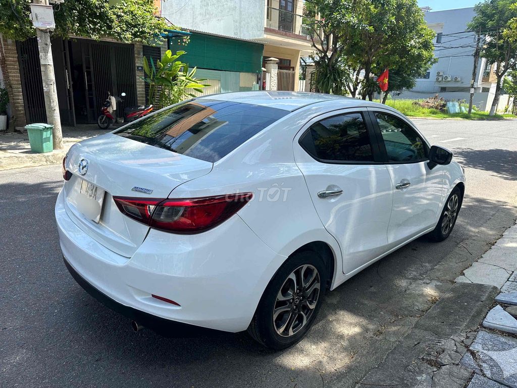 Mazda Mazda 2 2016 Белый 110 тыс. км