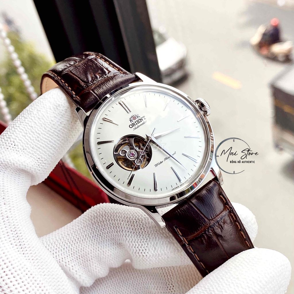 Đồng hồ Orient bambino lộ cơ dây da nâu