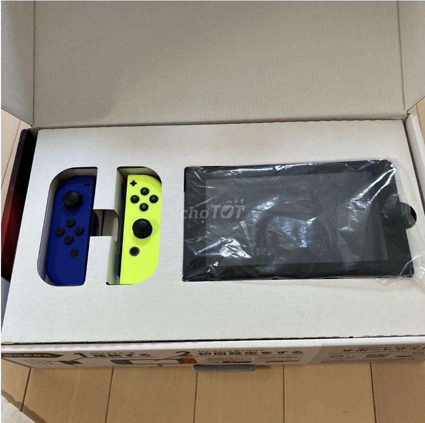 Nintendo Switch V1 Hắc Đen Xanh Vàng. Mua bán Thiết bị chơi game tại Huyện Hóc Môn Tp Hồ Chí Minh được đăng bởi Meomeo hình 1