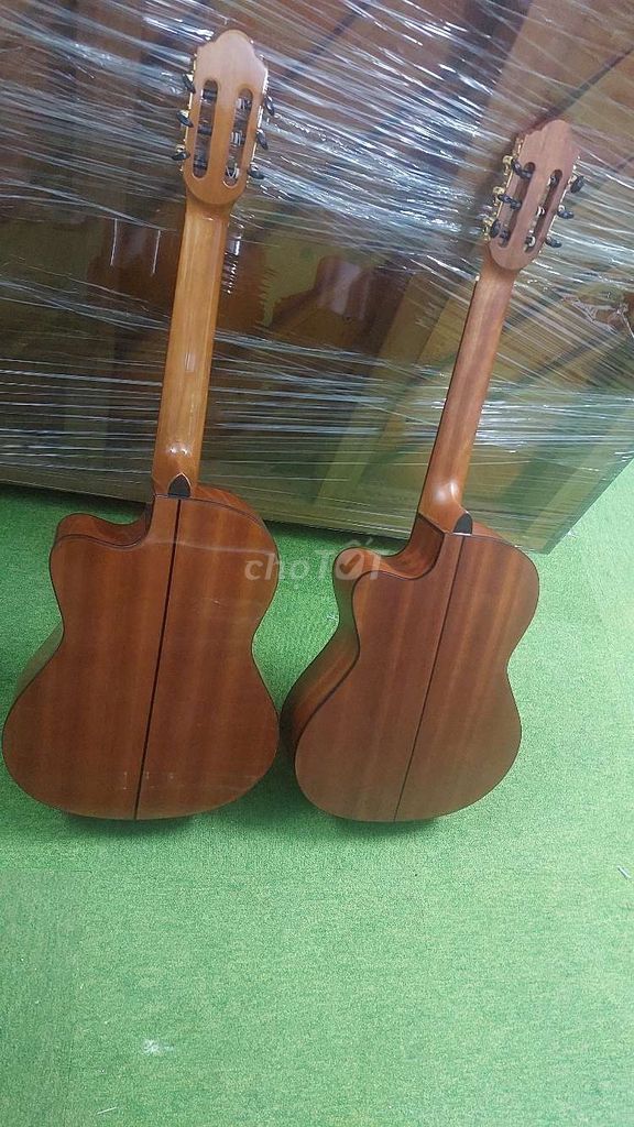 Guitar gỗ thịt cao cấp âm Mộc hay