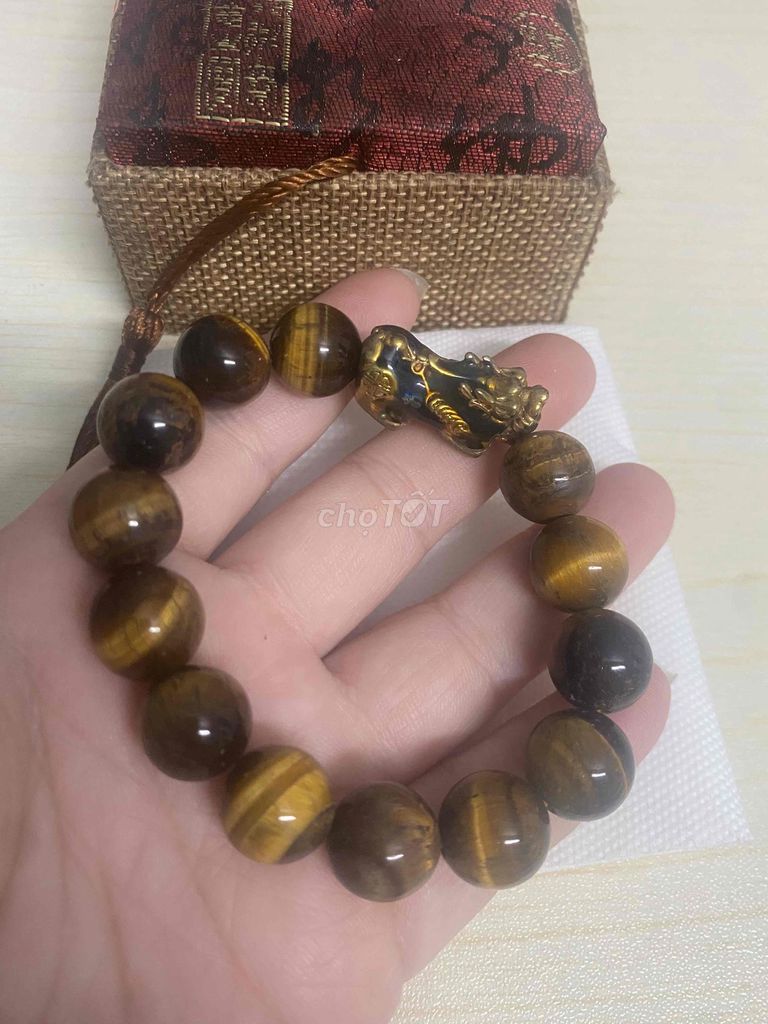 Vòng tay phong thủy Đá mắt hổ Nam 14 li. Mua bán Phụ kiện thời trang khác tại Quận 10 Tp Hồ Chí Minh được đăng bởi Le Na hình 1
