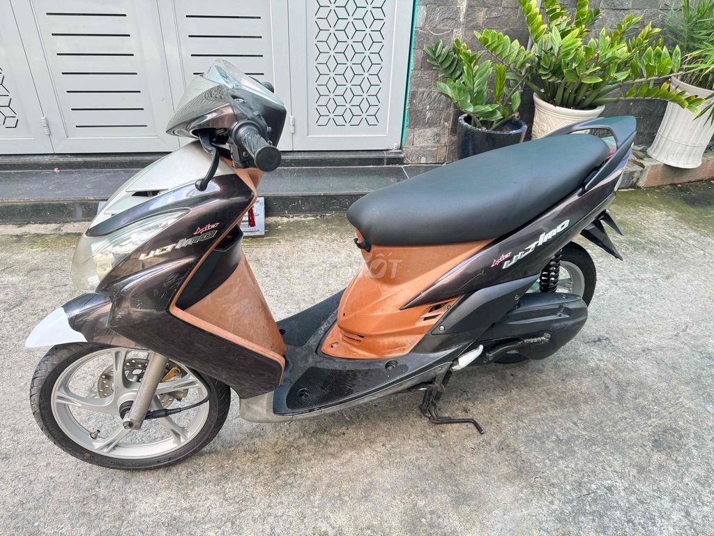Скутер Yamaha Ultimo коричневый, черный, белый