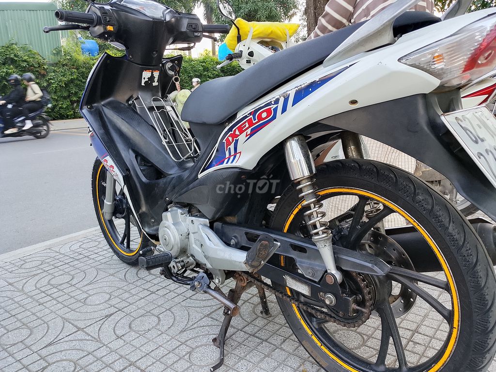 Suzuki Axelo Xanh trắng Đã sử dụng. Mua bán Xe máy tại Thành phố Thủ Đức Tp Hồ Chí Minh được đăng bởi Shop Chuyên Cũng Cấp Đồ Dùng Cá Nhân hình 6