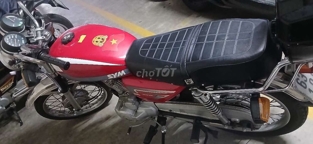 Xe mô tô SYM Wolf 125 năm 2010 màu đỏ rin 90%. Mua bán Xe máy tại Quận 5 Tp Hồ Chí Minh được đăng bởi Nguyễn Văn Bé hình 4
