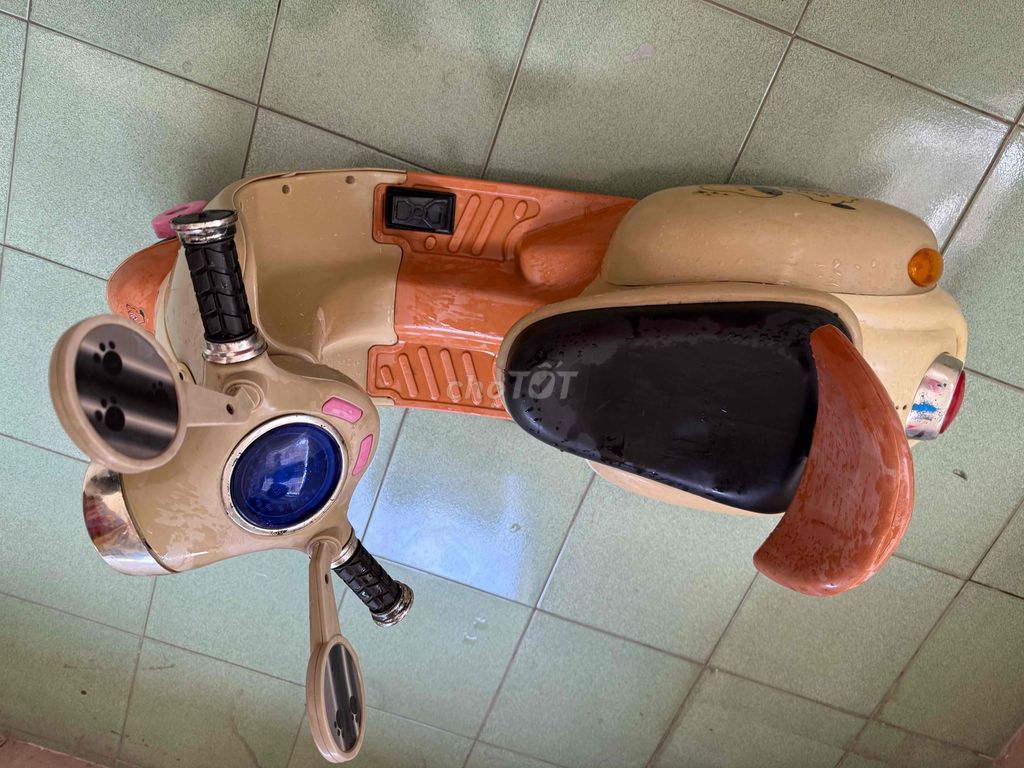 Xe máy điện trẻ em màu Kem. Mua bán Mẹ và bé tại Quận Tân Bình Tp Hồ Chí Minh được đăng bởi đỗ thị Quỳnh an hình 1