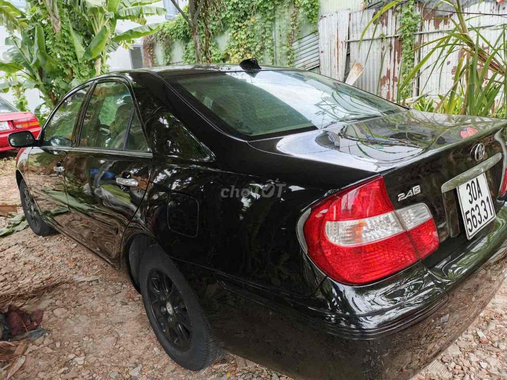Toyota Camry 2010 Черная 2.4L