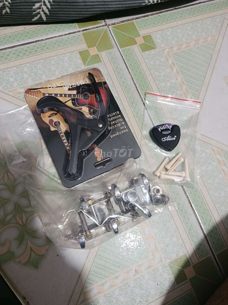 Phụ kiện đàn guitar. Mua bán Nhạc cụ tại Thành phố Thủ Dầu Một Bình Dương được đăng bởi châu hình 1