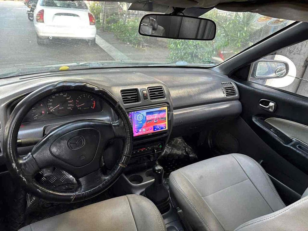 Mazda 323 2000 GLX 1.6MT - 252211 km. Mua bán Ô tô tại Thành phố Thủ Dầu Một Bình Dương được đăng bởi Ô TÔ CŨ BÌNH DƯƠNG hình 9