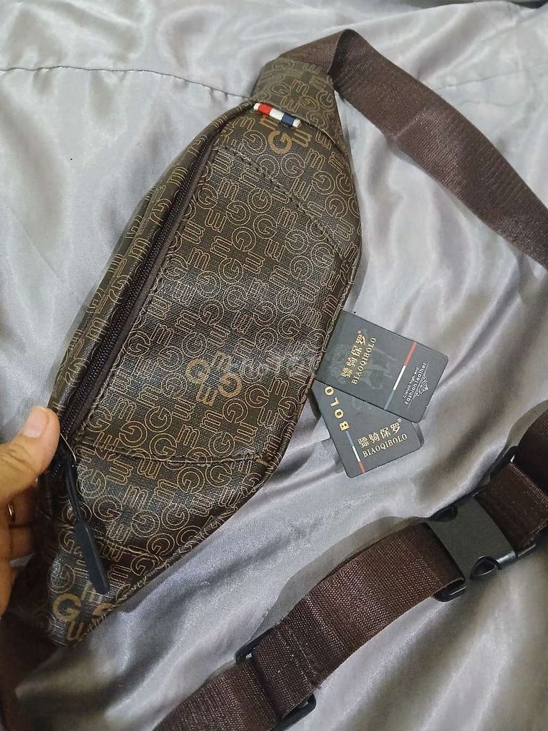 Túi đeo chéo Nam Da Qchau mới. Mua bán Túi xách tại Huyện Cần Giuộc Long An được đăng bởi Huong Phạm T  hình 1