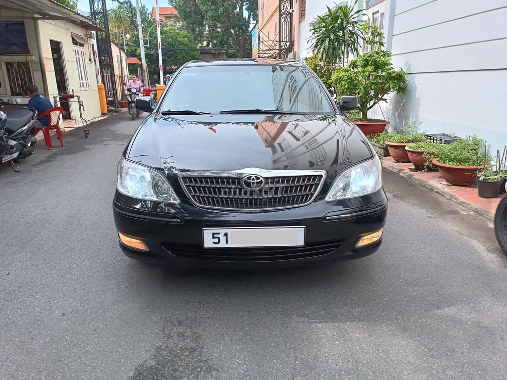 Toyota Camry 3.0V model 2004 màu đen cọp. Mua bán Ô tô tại Quận Gò Vấp Tp Hồ Chí Minh được đăng bởi Việt 8080 hình 1
