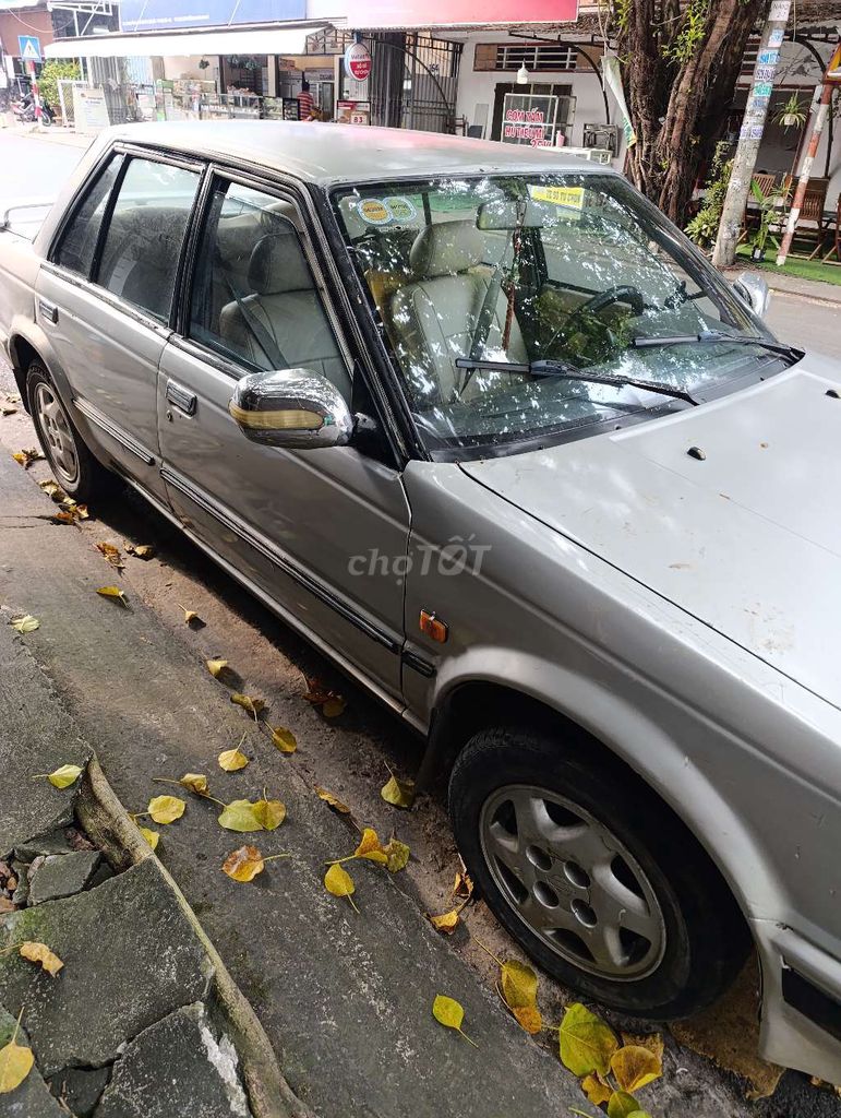 Nissan Bạc Số sàn. Mua bán Ô tô tại Huyện Long Hồ Vĩnh Long được đăng bởi Nguyễn Thái  hình 1