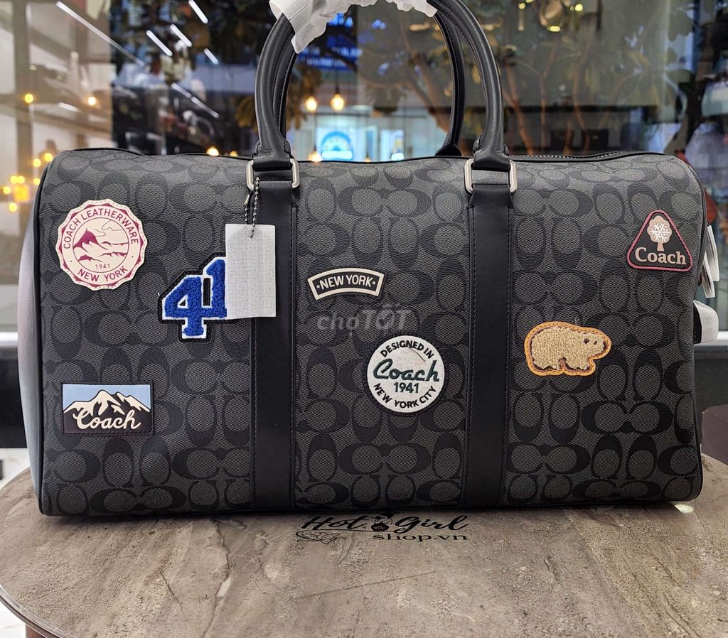 Túi du lịch coach họa tiết limited sticker