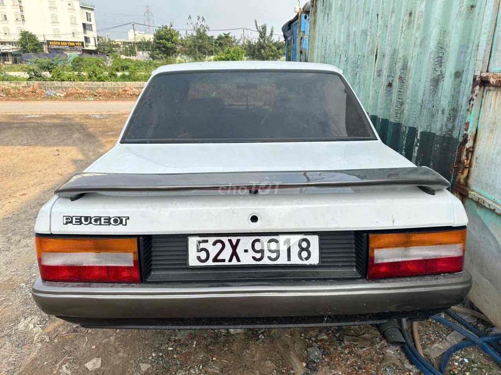 Peugeot 505 2002 Trắng 5 chỗ. Mua bán Ô tô tại Quận Bình Tân Tp Hồ Chí Minh được đăng bởi kiên hình 4